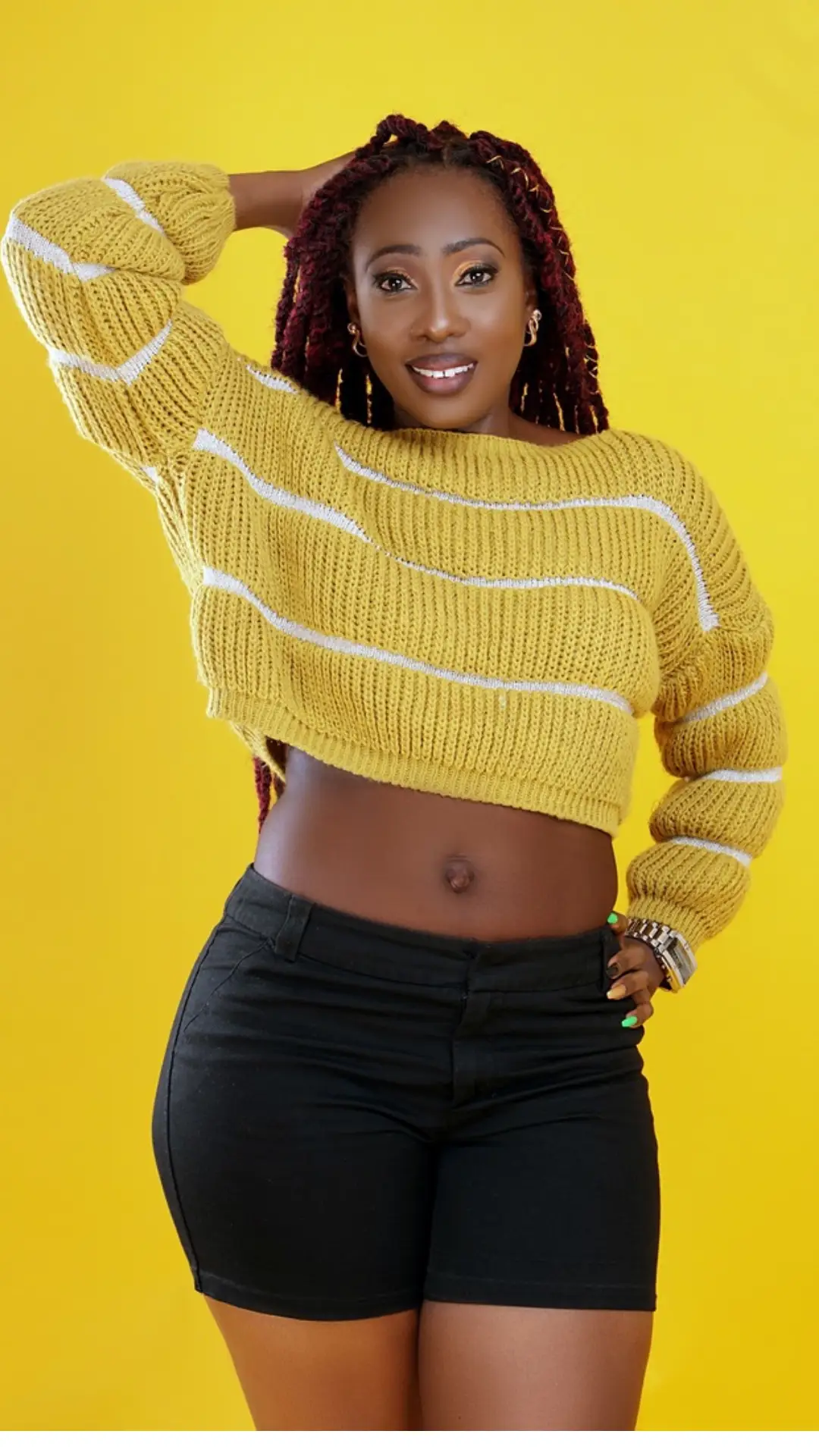 Merceline Akinyi smiling, founder and coach at FitThickChic